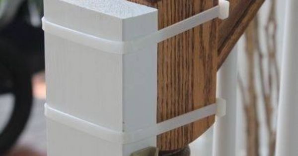 Instead of nailing a baby gate into a non-square banister, use cable ties t